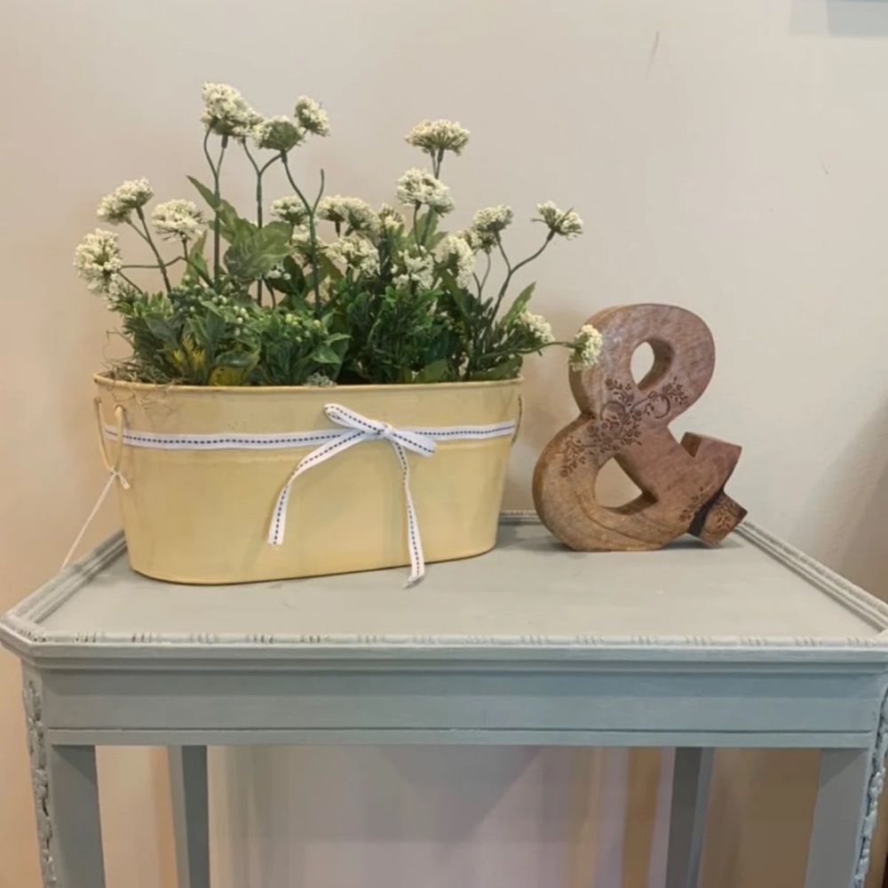 Yellow planter with Faux Florals